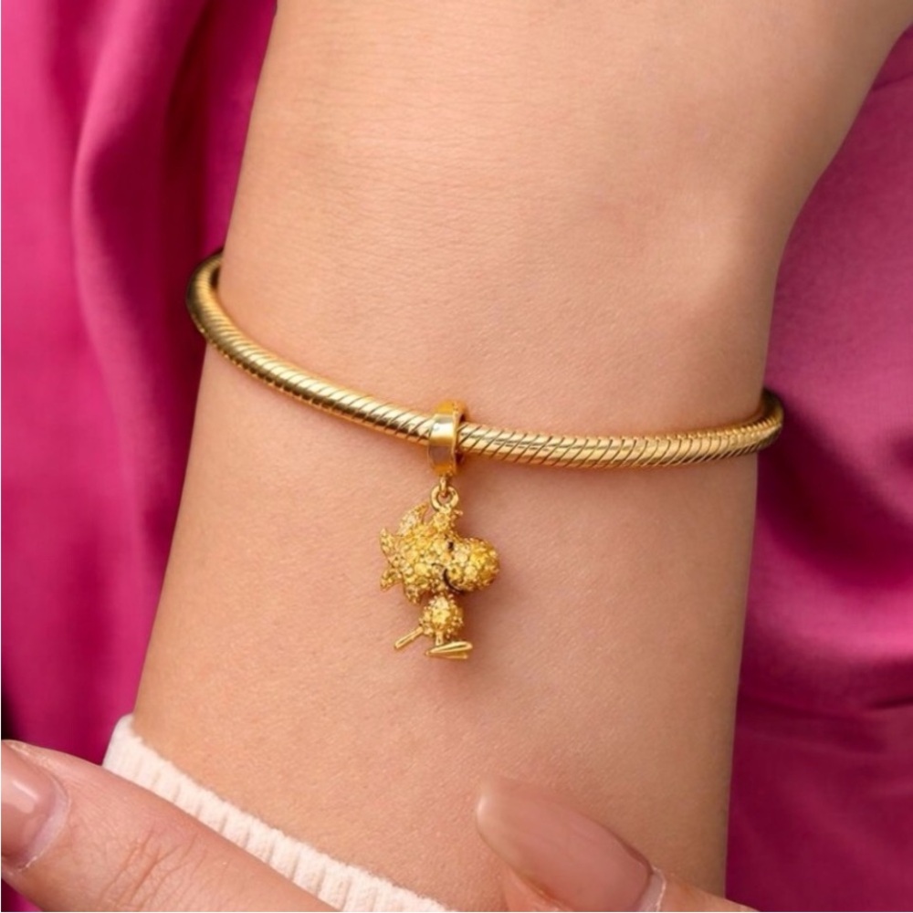 Peanuts Woodstock gold crystal Charm